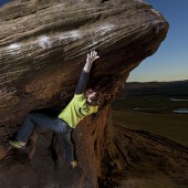 reaching high on a sandy pile of choss - photo by mark savage